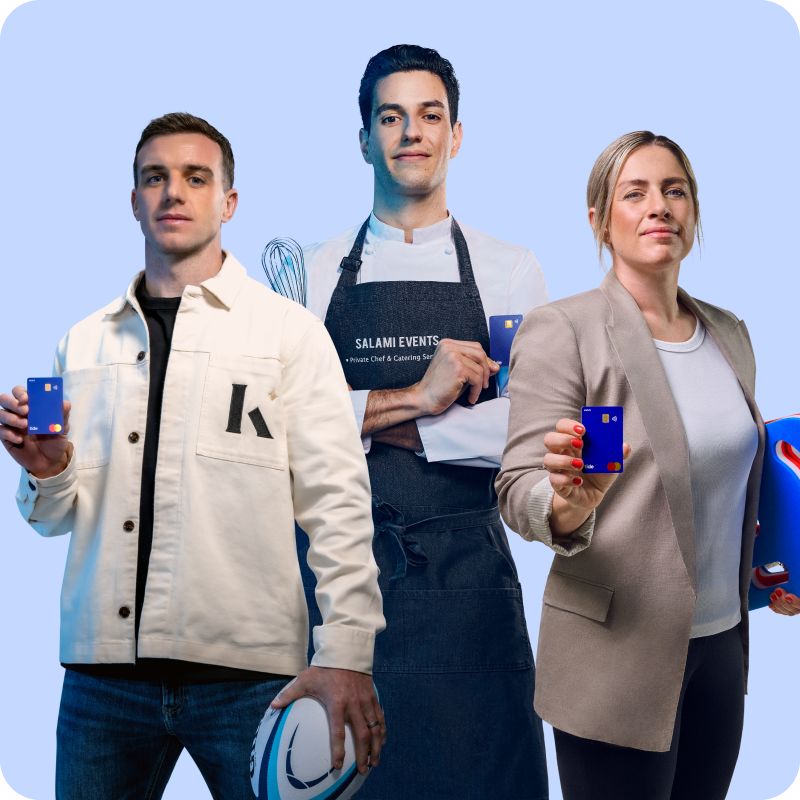 Drei Unternehmerinnen und Unternehmer mit Tide Karte