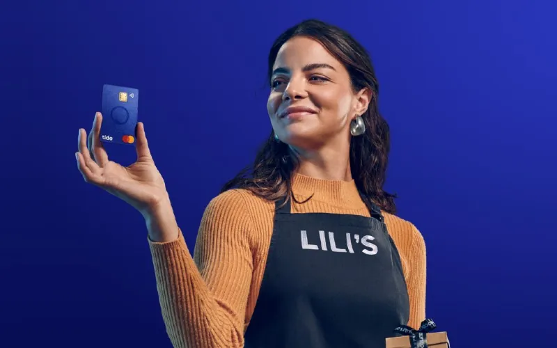 Unternehmerin mit Tide Karte